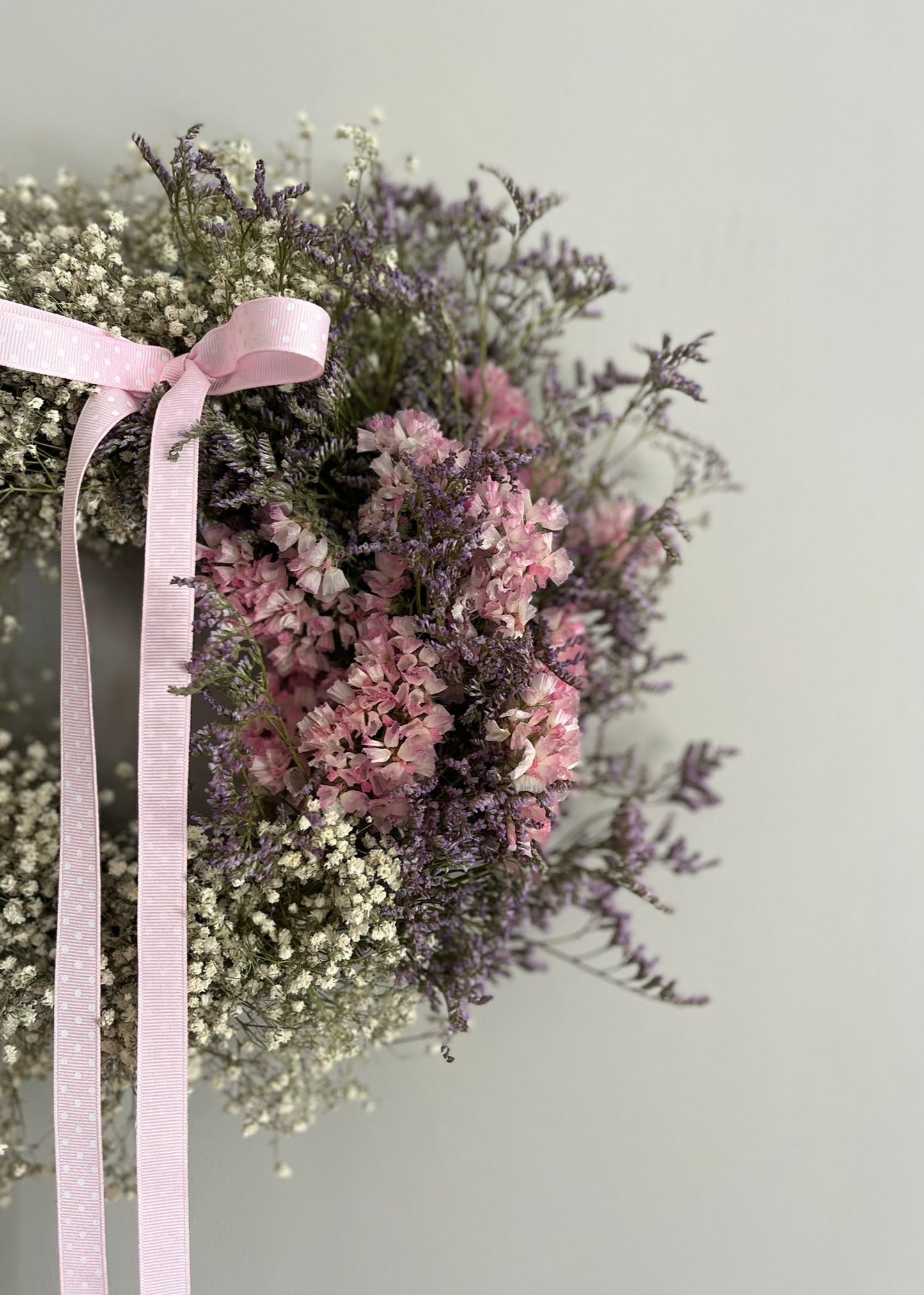 A pretty pink and white dried flower wreath with gypsophila—fresh from our spring range, full of soft textures and seasonal charm