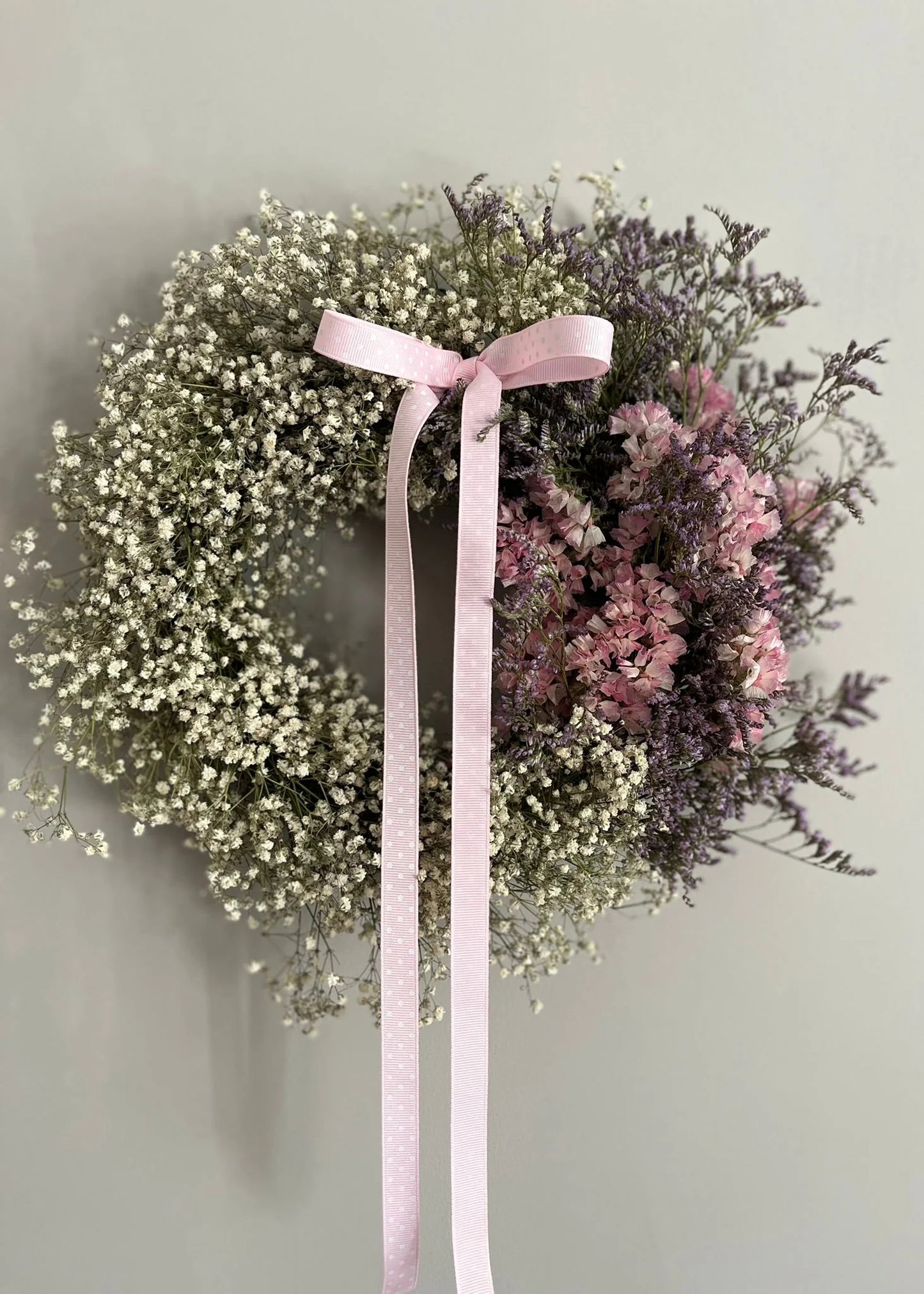 A pretty pink and white dried flower wreath with gypsophila—fresh from our spring range, full of soft textures and seasonal charm